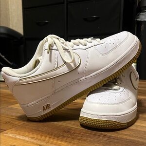 Nike White Sneakers with Gold Details
